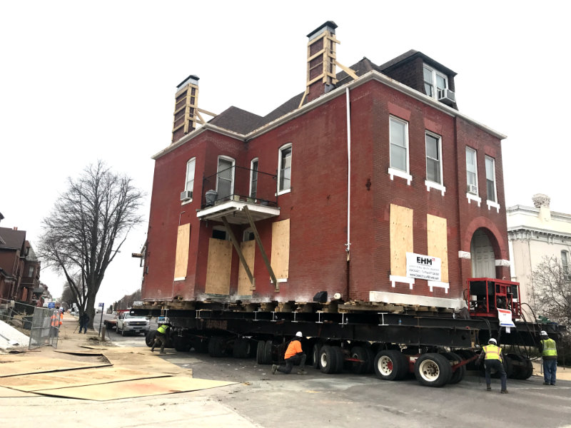 Historic brick home moved in Near North Neighborhood in preparation for the NGA West Campus